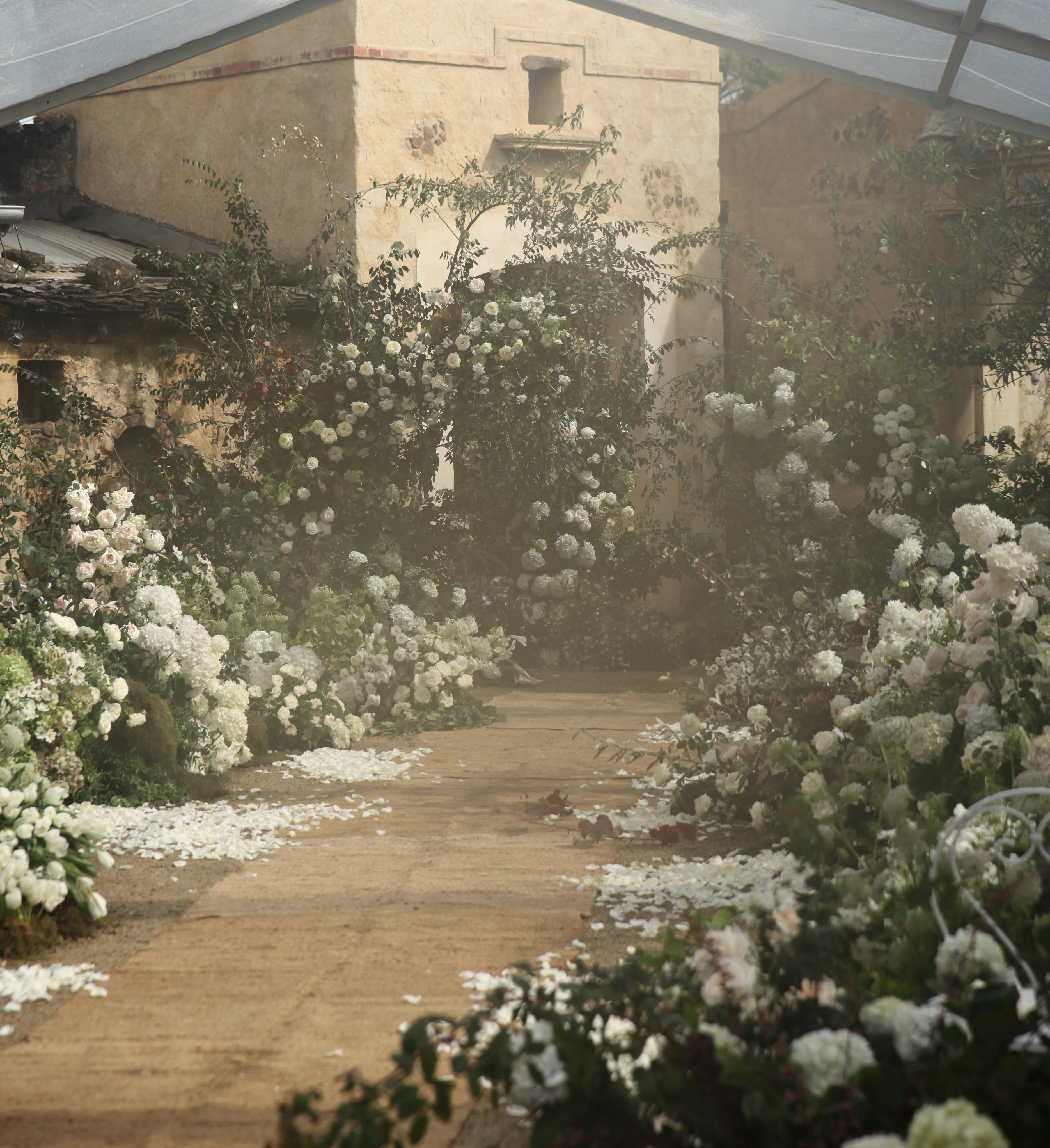 Fontana Floral &mdash; Overgrown garden wedding ceremony at Deux Belettes Byron Bay